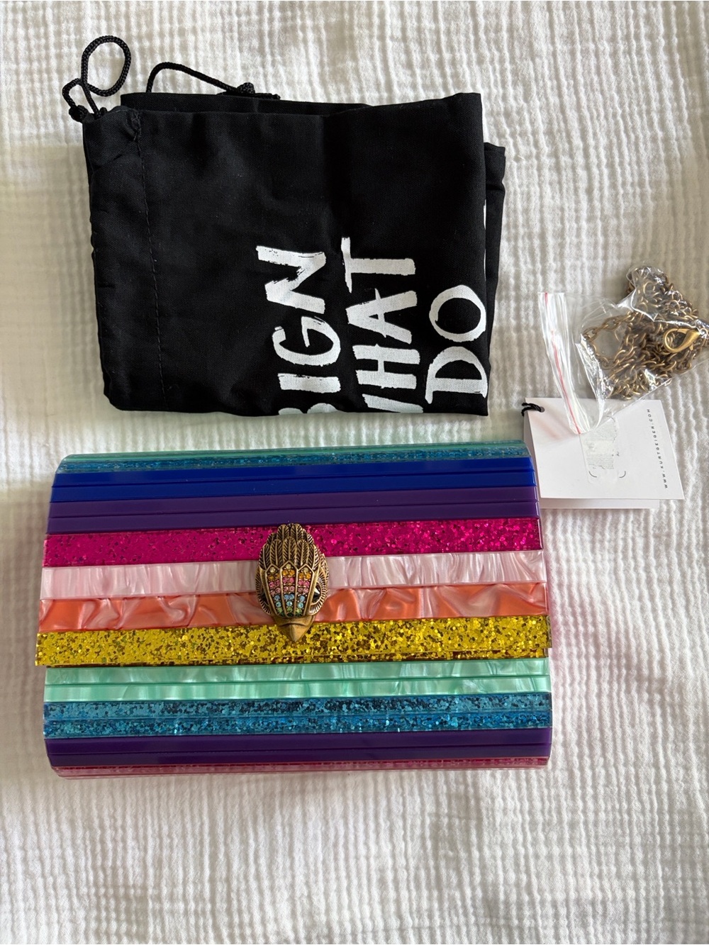 Kurt Geiger Rainbow Striped Clutch with Gold Decorative Accent